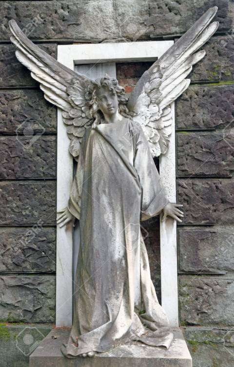 12170430-antique-cemetery-angel-on-monumental-cemetery-in-Florence-Italy--Stock-Photo.jpg